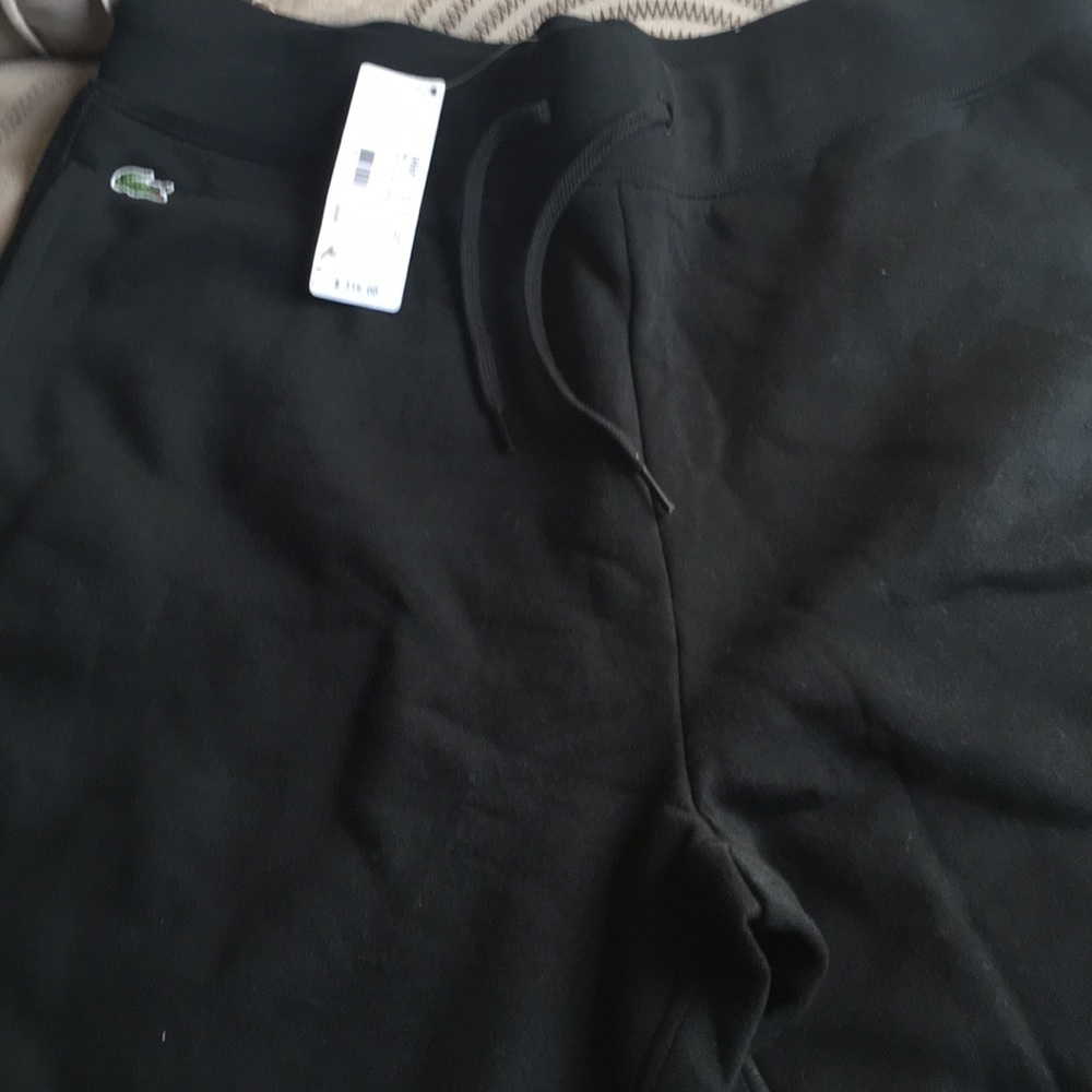 Lacoste sweat pants.